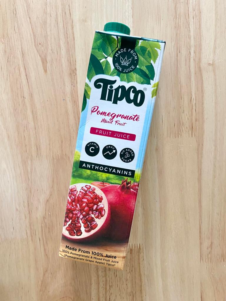 A box of tipco pomegranate juice