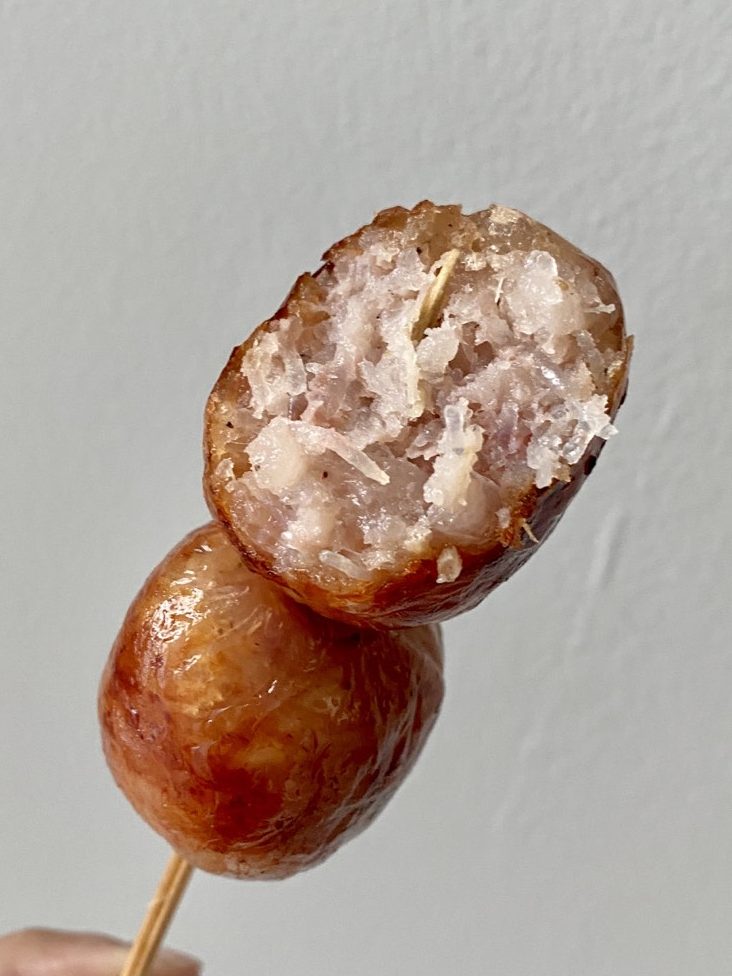 Inside the meaty, juicy, and flavorful Thai sausage.
